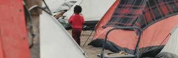 Playa Lobitos de Iquique: el campamento humanitario que puso el Gobierno para migrantes y que administra una productora de eventos